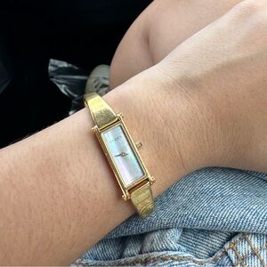 Vintage Gucci Gold Rectangular Watch with Iridescent Dial